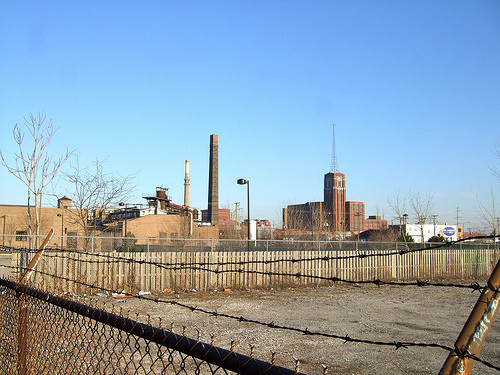 An industrial area in the Pilsen neighborhood of Chicago, with the Fisk Generating Station in the background.