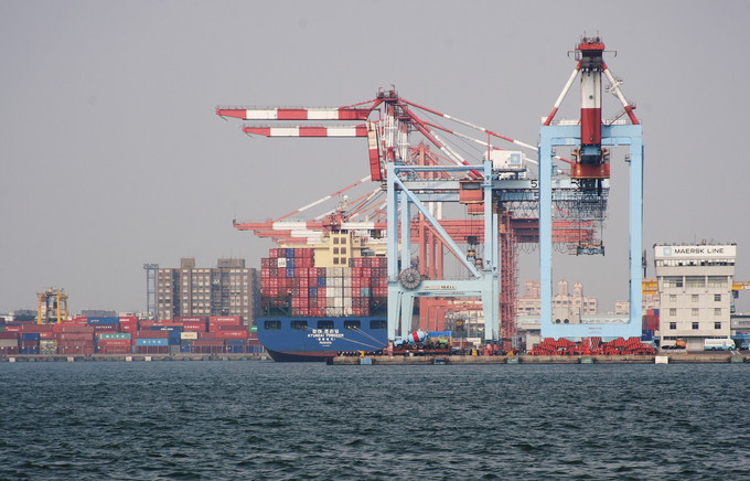 Container Ship in Kaoshiung Habor, ROC: Exporting raw materials accounts for the funds spent on importing finished goods.