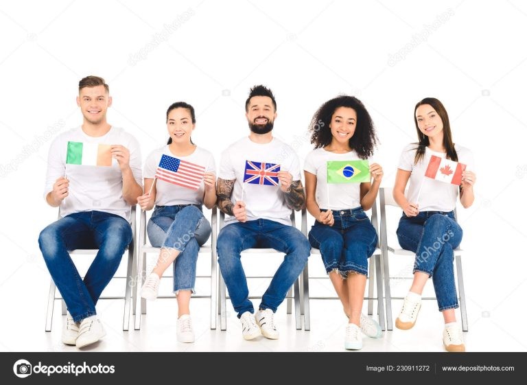 Five people are sitting in chairs holding flags from Ireland, the United States, Great Britain, Brazil, and Canada.