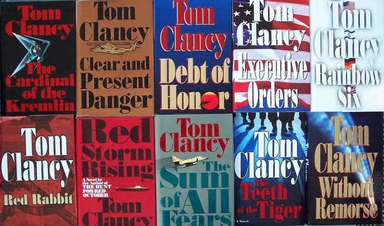 Set of Tom Clancy books. Each one features either the American flag, images of military aircraft, the Soviet flag, or unidentified enemy combatants.