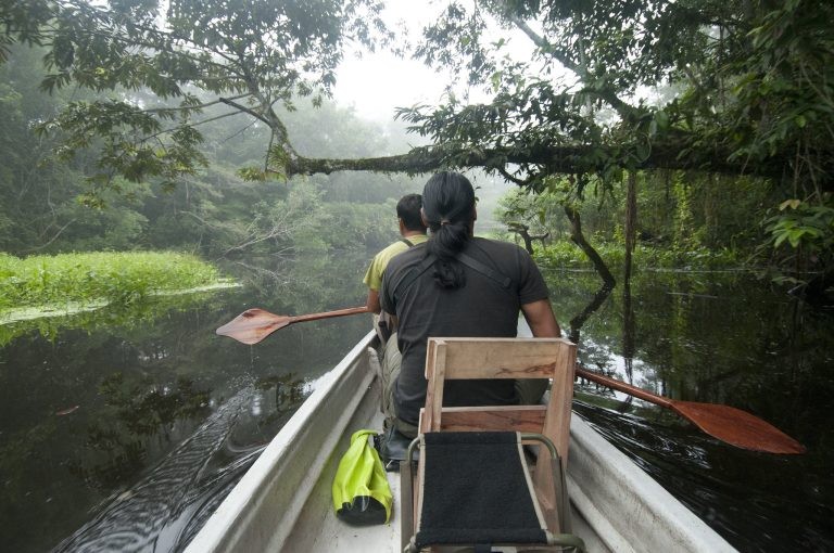 Experienced indigenous guides inspire eco-tourists at Napo Wildlife Center, Yasuni National Park, Ecuador